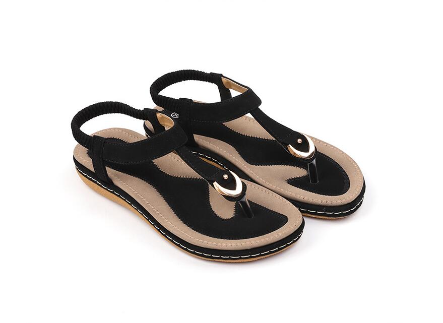 Ladies' chic beach flip flops by MANDOTOS INTERNATIONAL with stylish straps and comfortable soles for summer wear.
