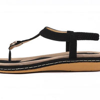 Ladies' chic beach flip flops from MANDOTOS INTERNATIONAL with stylish straps and comfortable soles, perfect for summer.