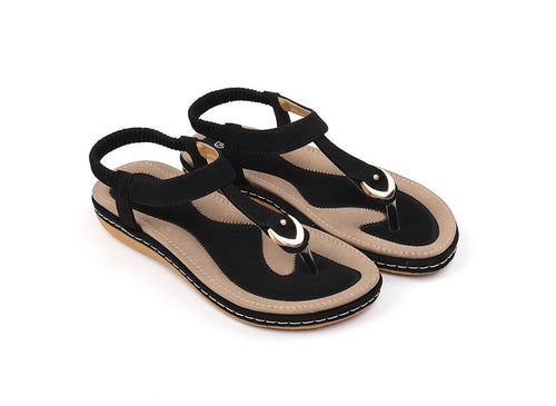 Ladies' chic beach flip flops by MANDOTOS INTERNATIONAL with stylish straps and comfortable sole, perfect for summer outings.
