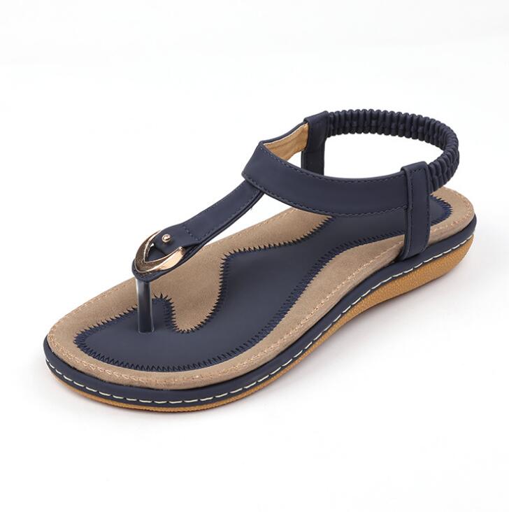 Ladies' chic beach flip flops by MANDOTOS INTERNATIONAL featuring stylish design and comfortable soles for summer wear.