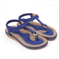 Ladies' chic beach flip flops by MANDOTOS INTERNATIONAL featuring stylish straps and comfortable sole for summer wear.