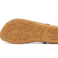 Ladies' chic beach flip flops from MANDOTOS INTERNATIONAL with stylish straps and comfortable sole, perfect for summer outings.