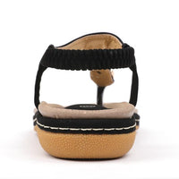 Ladies' chic beach flip flops by MANDOTOS INTERNATIONAL featuring stylish design and comfortable slip-on style.