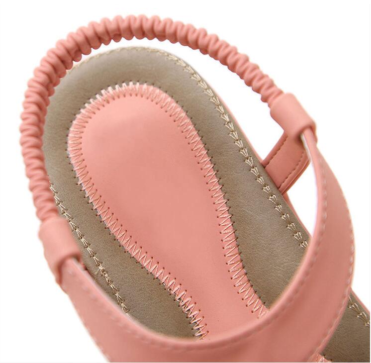 Ladies' chic beach flip flops by MANDOTOS INTERNATIONAL featuring stylish design and comfortable slip-on style for warm weather.