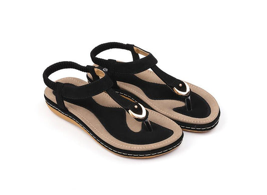 Ladies' chic beach flip flops by MANDOTOS INTERNATIONAL with stylish straps and comfortable soles, perfect for summer beach outings.