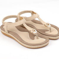 Ladies' chic beach flip flops by MANDOTOS INTERNATIONAL featuring stylish straps and comfortable soles for summer wear.