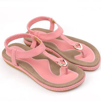Ladies' chic beach flip flops by MANDOTOS INTERNATIONAL with stylish straps and comfortable soles, perfect for summer footwear.