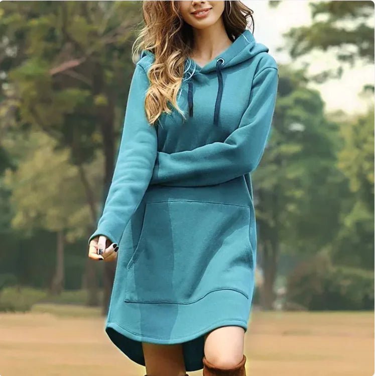 Ladies' hoodie dress by MANDOTOS INTERNATIONAL with front pockets, soft fabric, and a casual, comfortable fit.