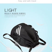 Large capacity basketball backpack with drawstring pockets by MANDOTOS INTERNATIONAL, featuring multiple storage compartments and sporty design.