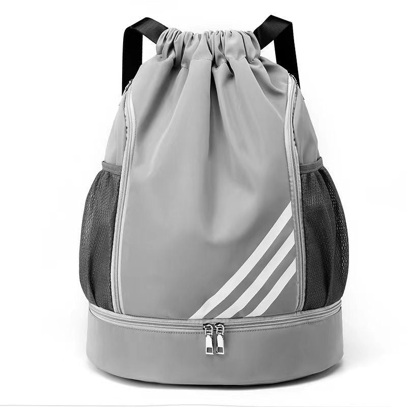 Large capacity drawstring basketball backpack by MANDOTOS INTERNATIONAL with multiple pockets and adjustable straps.