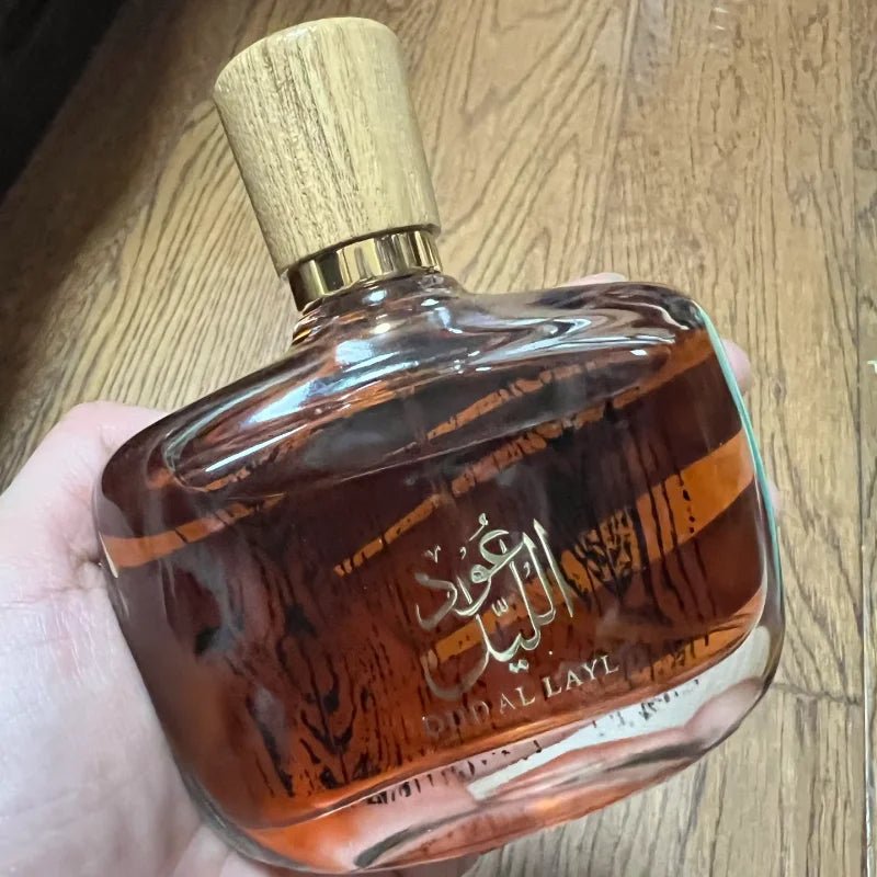 Luxury Arabian Musk Oud and Cedarwood men's Eau de Toilette by MANDOTOS INTERNATIONAL, featuring a sleek glass bottle with a dark cap.