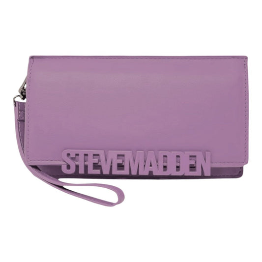 Madden BCabby Wristlet by Mandotos International in mauve with gold-tone hardware and a compact design for essentials.