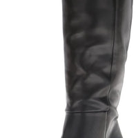 Black Madden Girl William knee-high boots with chunky heel and pointed toe, designed for stylish fall and winter wear.