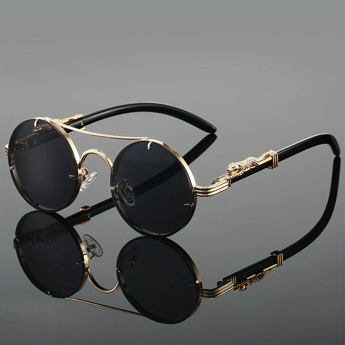 Men's black metal framed sunglasses with TAC lenses for day and night driving, stylish daily leisure eyewear by MANDOTOS INTERNATIONAL.