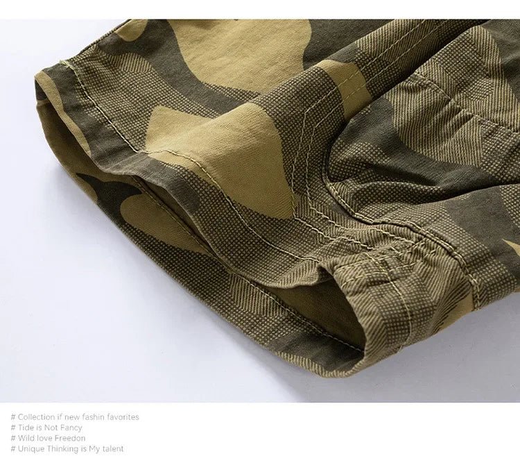Men's camouflage outdoor stretch tooling shorts by MANDOTOS INTERNATIONAL, featuring a relaxed fit and functional design.