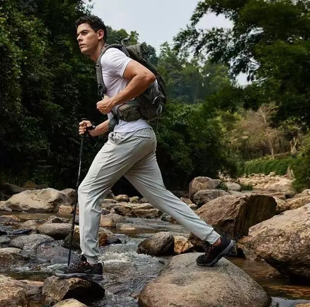 Men's lightweight waterproof hiking shoes by MANDOTOS INTERNATIONAL, designed for all-season outdoor trekking.