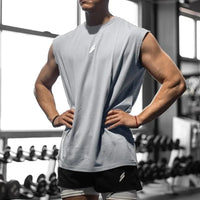 Men's quick-drying sleeveless fitness shirt and summer mesh basketball tank top by MANDOTOS INTERNATIONAL, featuring breathable athletic mesh fabric.