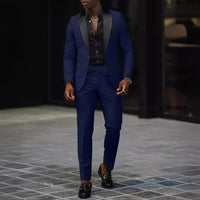 Men's slim-fit business casual suit jacket and trousers by MANDOTOS INTERNATIONAL, tailored fit, in classic dark color.