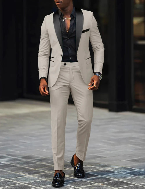Men's slim-fit business casual suit jacket and trousers by MANDOTOS INTERNATIONAL, tailored fit for professional style.