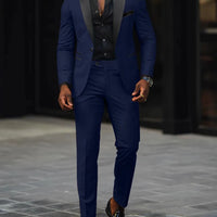 Men's slim-fit business casual suit jacket and trousers by MANDOTOS INTERNATIONAL, tailored fit, dark fabric, front view.