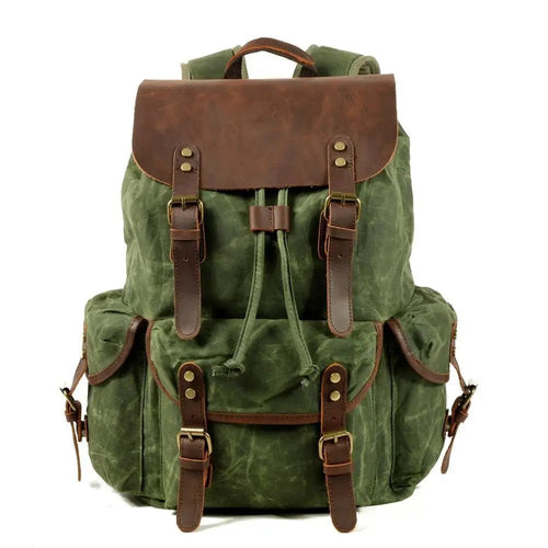 Men's vintage batik canvas and leather backpack by Mandotos International, showcasing a stylish, handcrafted design with adjustable straps.