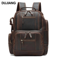 Men's vintage leather backpack by MANDOTOS INTERNATIONAL with multiple compartments for school and travel use.