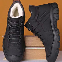 Men's MANDOTOS INTERNATIONAL winter ankle boots, waterproof and non-slip work shoes with sturdy design and winter-ready features.