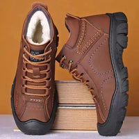 Men's winter ankle boots by MANDOTOS INTERNATIONAL featuring waterproof material and non-slip sole for work and outdoor wear.