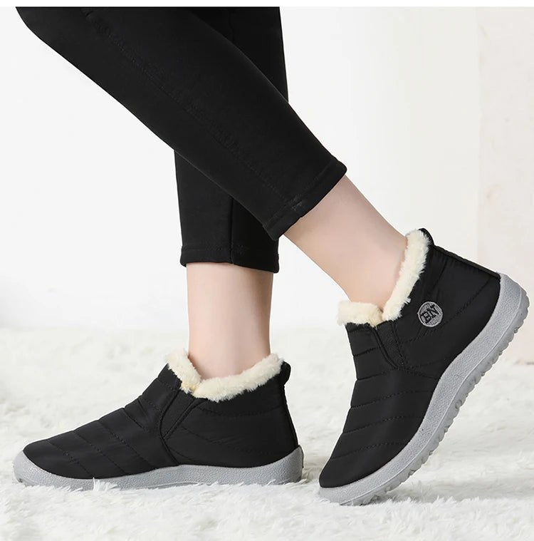 Men's waterproof winter snow boots by MANDOTOS INTERNATIONAL, outdoor work shoes in plus size, durable and warm for cold weather.