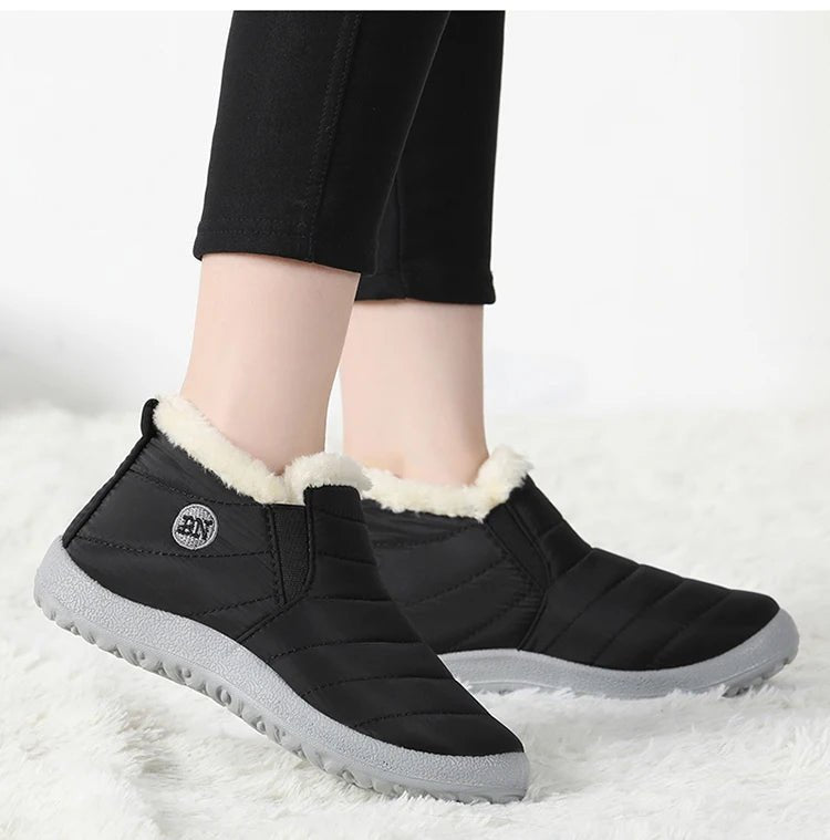 Men's waterproof winter snow boots by MANDOTOS INTERNATIONAL, outdoor work shoes in plus size with rugged traction and insulated lining.