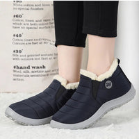 Men's waterproof winter snow boots by MANDOTOS INTERNATIONAL, outdoor work shoes in plus size with rugged tread and insulated lining.
