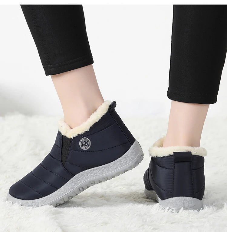 Men's waterproof winter snow boots by MANDOTOS INTERNATIONAL, outdoor work shoes with durable soles and plus size fit.
