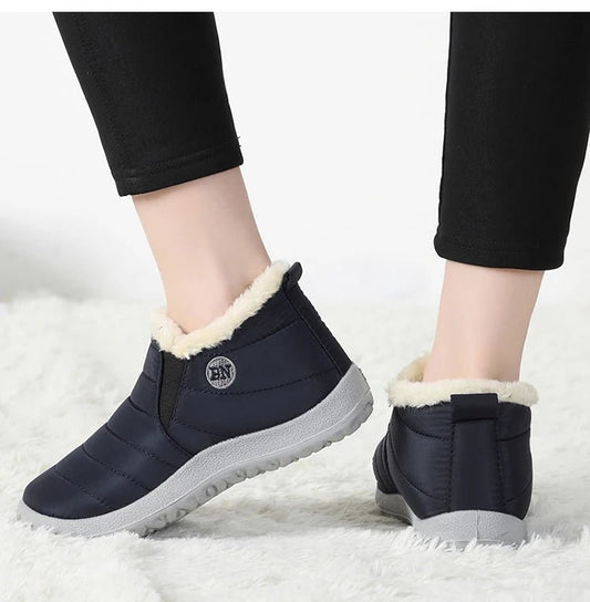 Men's waterproof winter snow boots by MANDOTOS INTERNATIONAL, outdoor work shoes with durable soles and plus size fit.