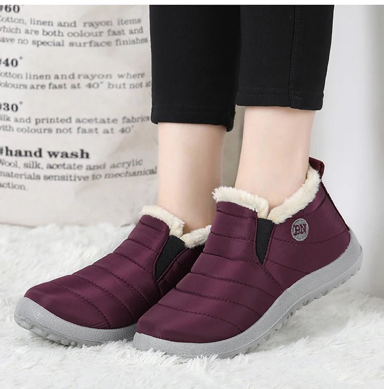 Men's waterproof winter snow boots by MANDOTOS INTERNATIONAL, outdoor work shoes with sturdy soles and plus-size fit.