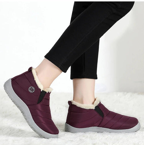 Men's waterproof winter snow boots by MANDOTOS INTERNATIONAL, outdoor work shoes with sturdy design and plus size fit.