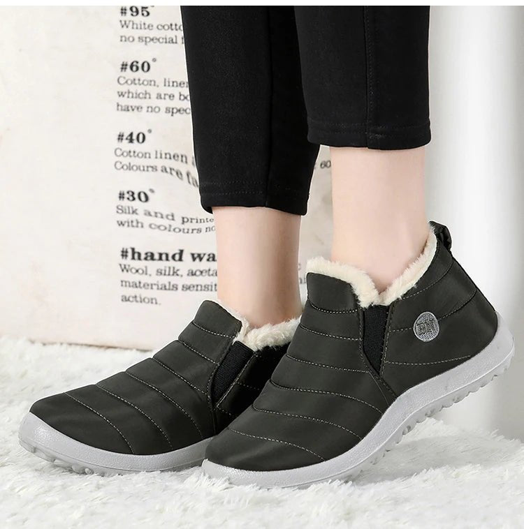 Men's waterproof winter snow boots by MANDOTOS INTERNATIONAL, outdoor work shoes in plus size with rugged traction and insulated design.