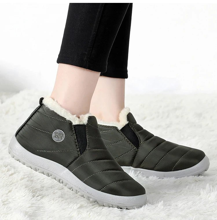 Men's waterproof winter snow boots by MANDOTOS INTERNATIONAL, outdoor work shoes in plus size with rugged traction and insulated lining.