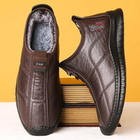 Men's winter waterproof non-slip platform work boots by Mandotos International, size 38-48, sturdy and suitable for cold weather.