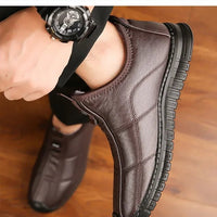 Men's winter waterproof non-slip platform work boots by MANDOTOS INTERNATIONAL, size 38-48, featuring sturdy construction and slip-resistant soles.
