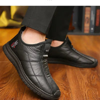 Men's winter waterproof non-slip platform work boots by MANDOTOS INTERNATIONAL, size 38-48, with sturdy sole and durable design.