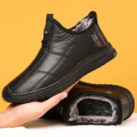 Mandotos men's winter waterproof non-slip platform work boots, size 38-48, with sturdy design and slip-resistant soles.