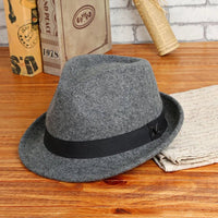 Men's winter felt fedora hat by MANDOTOS INTERNATIONAL, thick wool jazz cap with narrow brim and classic Homburg style.