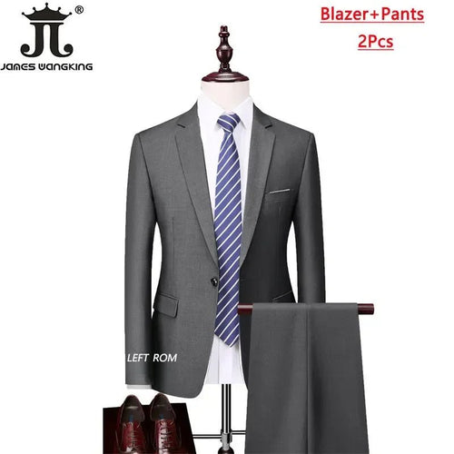 Mens 3-piece business suit set by MANDOTOS INTERNATIONAL with jacket, vest, and pants in various sizes and colors.