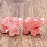 Mini elephant crystal sculpture by MANDOTOS INTERNATIONAL, detailed clear crystal figurine of an elephant on a smooth base.