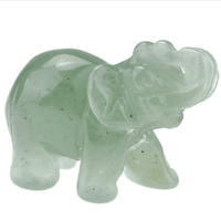Mini elephant crystal sculpture by MANDOTOS INTERNATIONAL, detailed glass figurine showcasing intricate design and craftsmanship.
