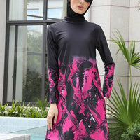 Mandotos International modest coverage Muslim burkini, stylish swimwear for middle-aged women, featuring full-coverage design in vibrant fabric.