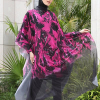 Mandotos International modest coverage Muslim burkini with full-body design and stylish, functional swimwear for middle-aged women.