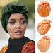 Muslim-style mirror hats and African headgear for women, featuring intricate designs and reflective mirror accents by MANDOTOS INTERNATIONAL.