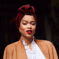 Muslim-style mirror hats and African headgear for women with intricate patterns and embellishments by MANDOTOS INTERNATIONAL.