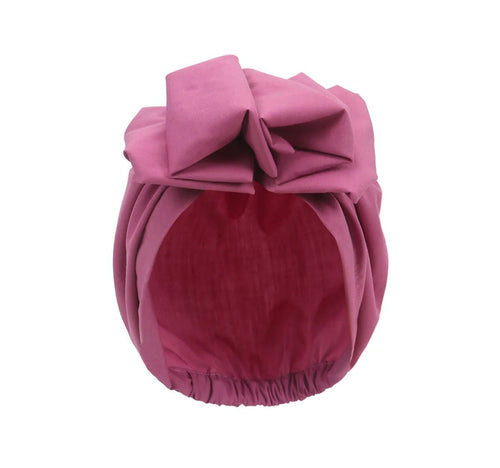 Muslim-style mirror hats and African headgear for women featuring intricate designs and vibrant patterns by MANDOTOS INTERNATIONAL.